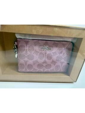 Coach Boxed Corner Zip Signature C Metallic Pink Wristlet Pouch with Two Charms